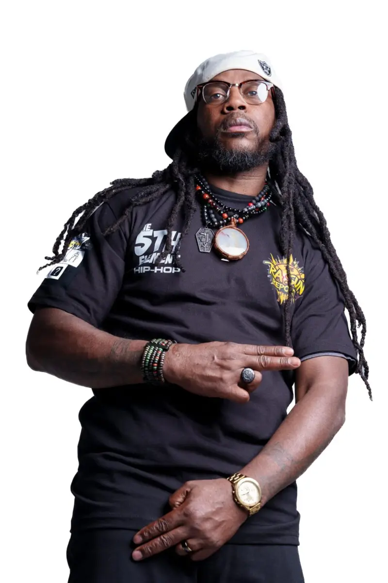 Rasun in a studio portrait wearing 5th Element apparel